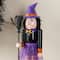 Glitzhome® 18.5"H Halloween Wooden Witch Nutcracker with Witch Cat Ornament